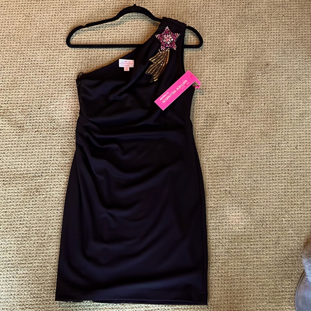 Little black one shoulder dress.